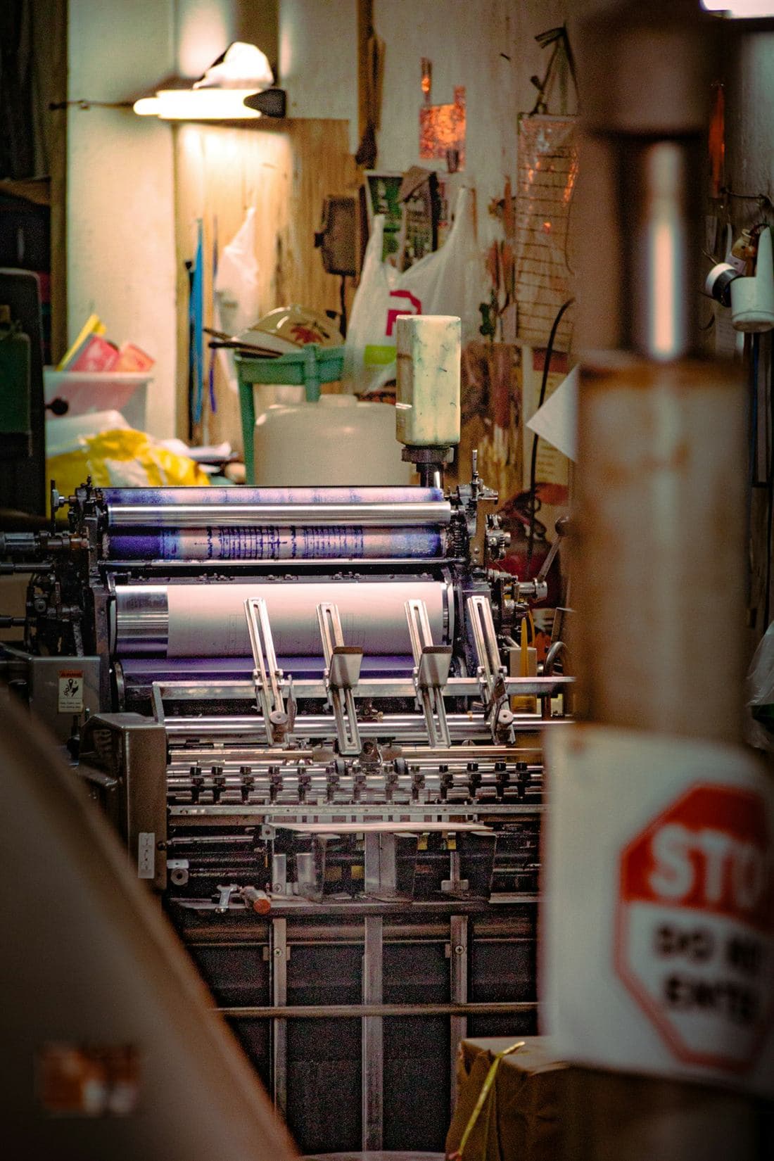 A commercial printing press running a job